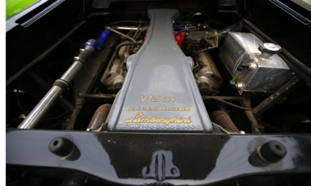The engine of a handmade replica of Lamborghini Diablo is pictured outside a garage rented by Wang and Li on the outskirts of Beijing